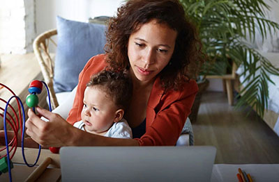 mother and child on computer