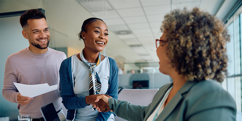 Two people meet with a financial professional