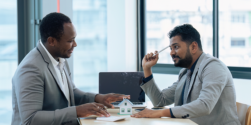 Discussing homebuying with a real estate professional.