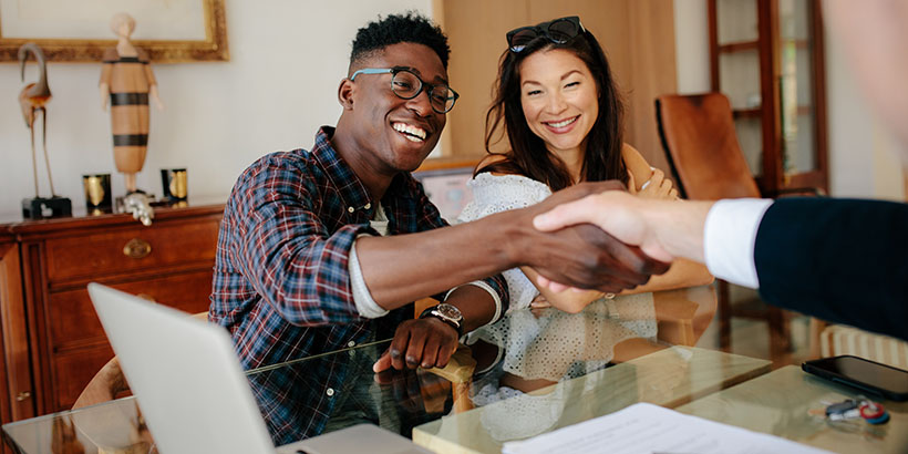 Excited homebuyers closing on the purchase
