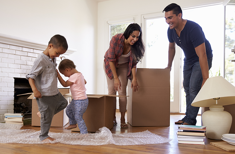 Family with moving boxes
