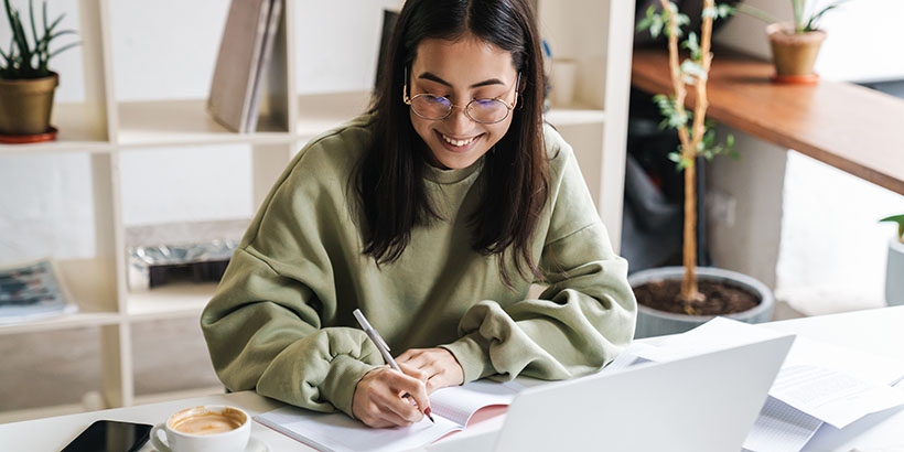 Young homebuyer making a list