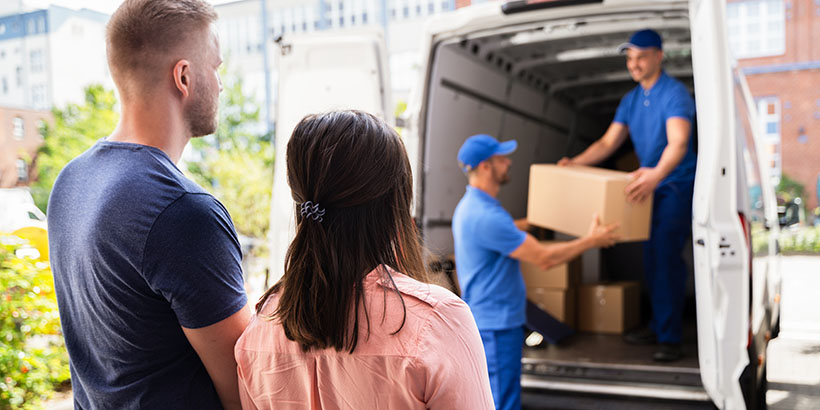 Couple watching movers