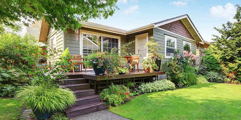 Single-family home with porch and garden