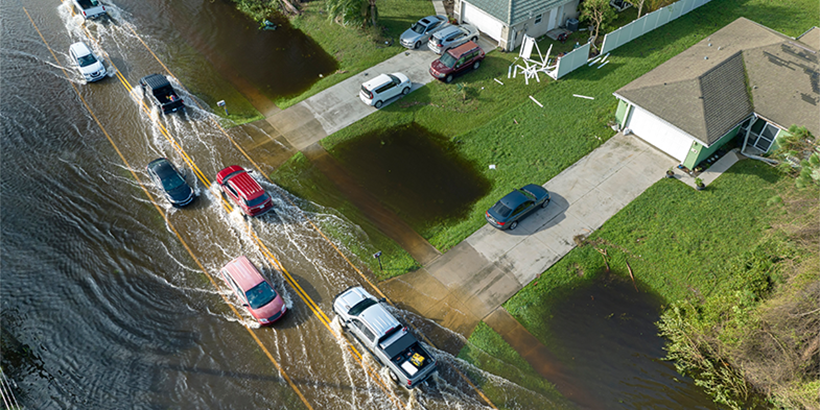 Cars parked on a flooded street