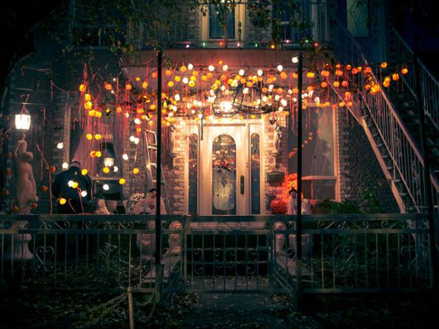 Would you buy a home next to a cemetery? - image of a home decorated for halloween