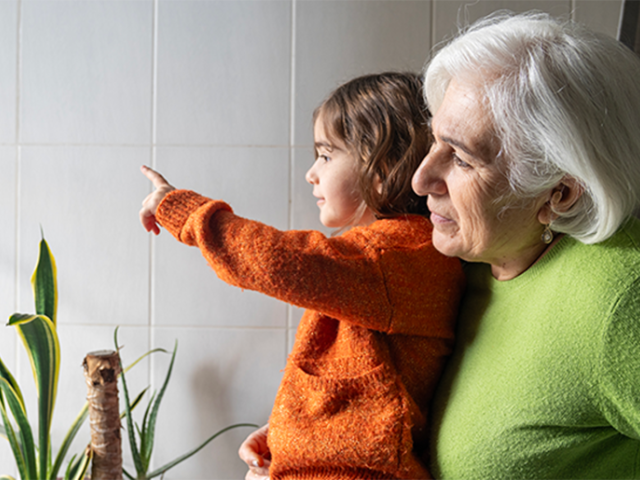 Grandparent holding child