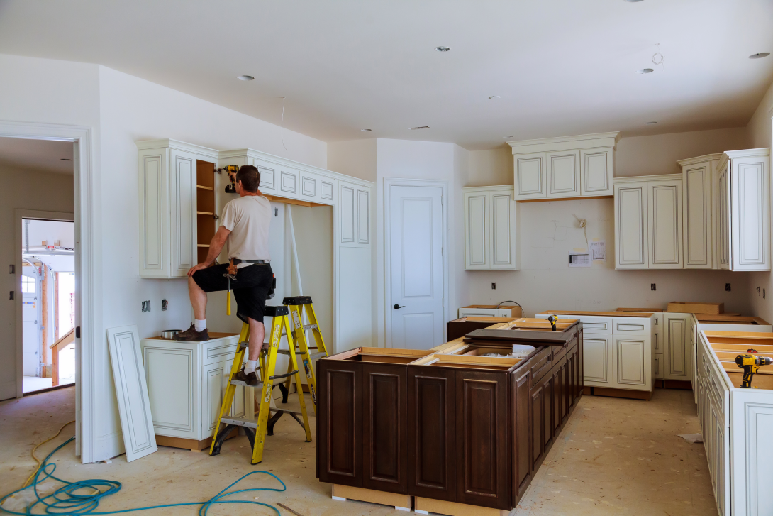 Person working on a kitchen remodel