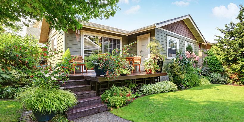 Single-family home with porch and garden