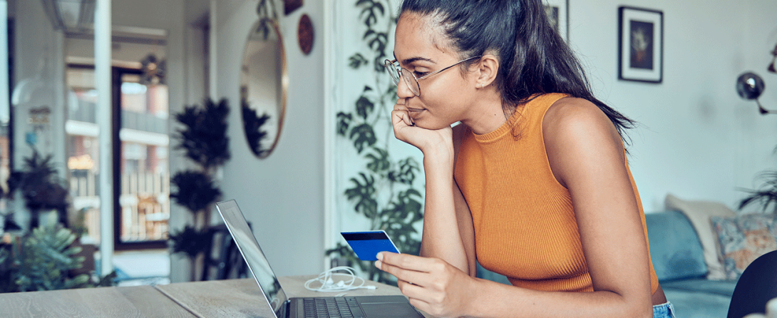 Person considering making an online purchase with a credit card