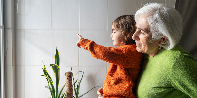 Grandparent holding child