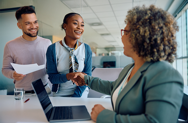 Two people meet with a financial professional