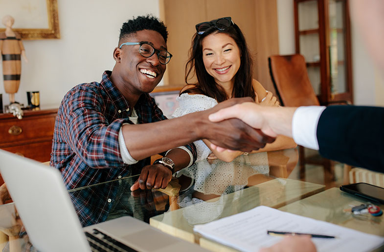 Excited homebuyers closing on the purchase