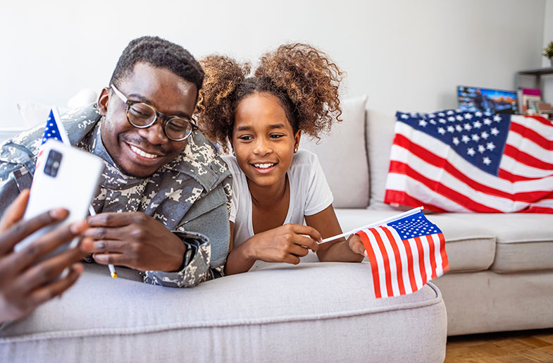 Military service member with daughter