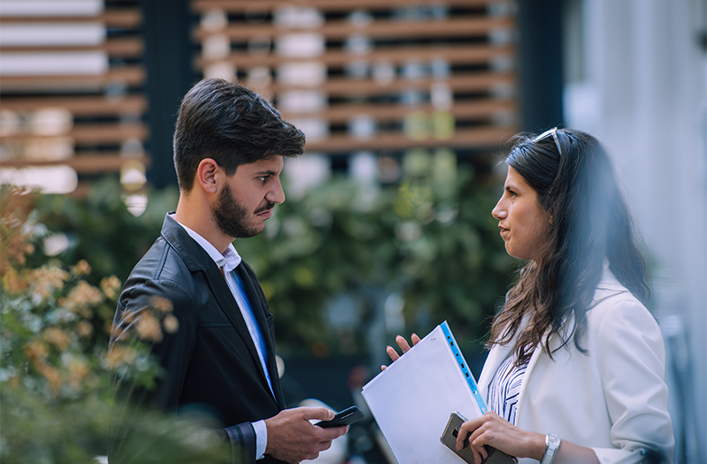 Homebuyer and real estate agent discussing a counteroffer