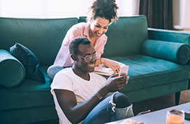 Couple looking at cell phone