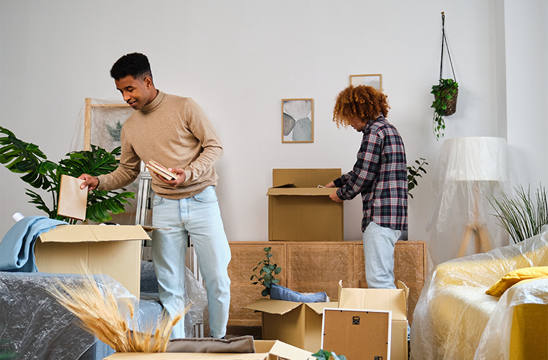 couple packing up their living room