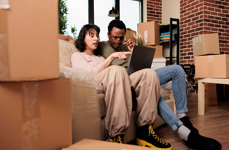 Couple with moving boxes