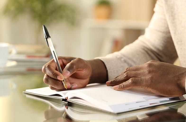Person writing notes